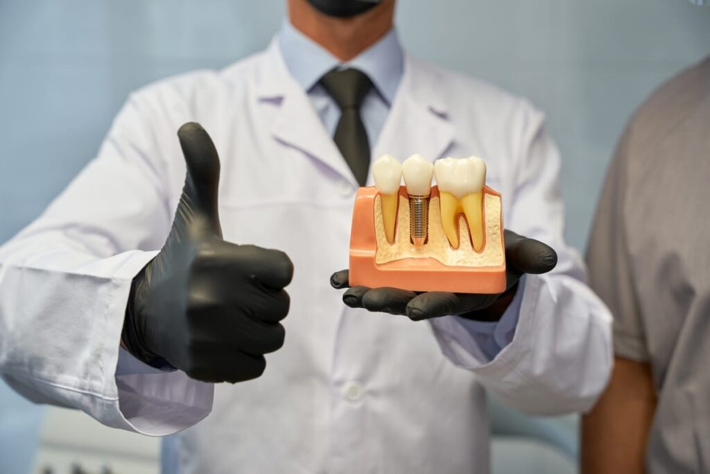 Implants vs Dentures in Springfield